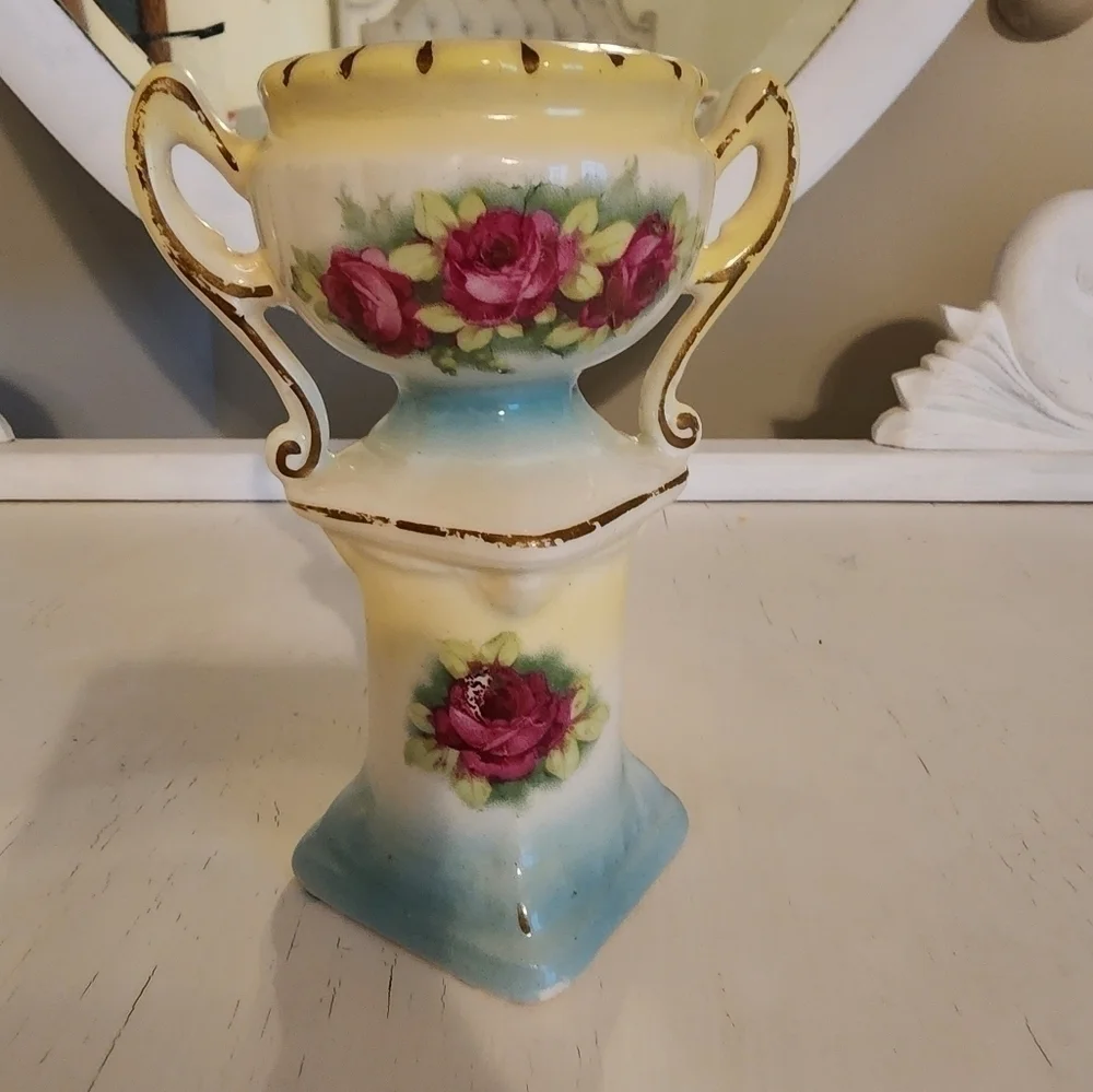 Vintage hand-painted porcelain urn/vase on pillar.